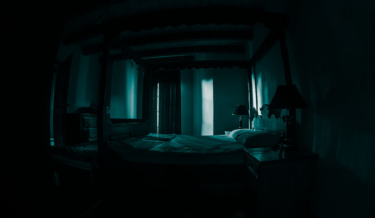 A creepy dark bedroom scenery with dark windows. Horror concept