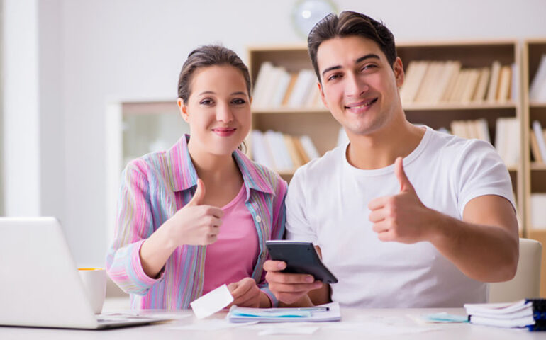Young family discussing the #1 financial planning risk