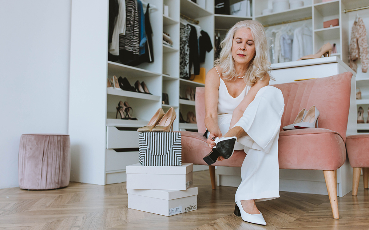 Woman trying expensive shoes